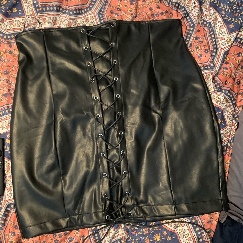 Faux leather lace up mini skirt